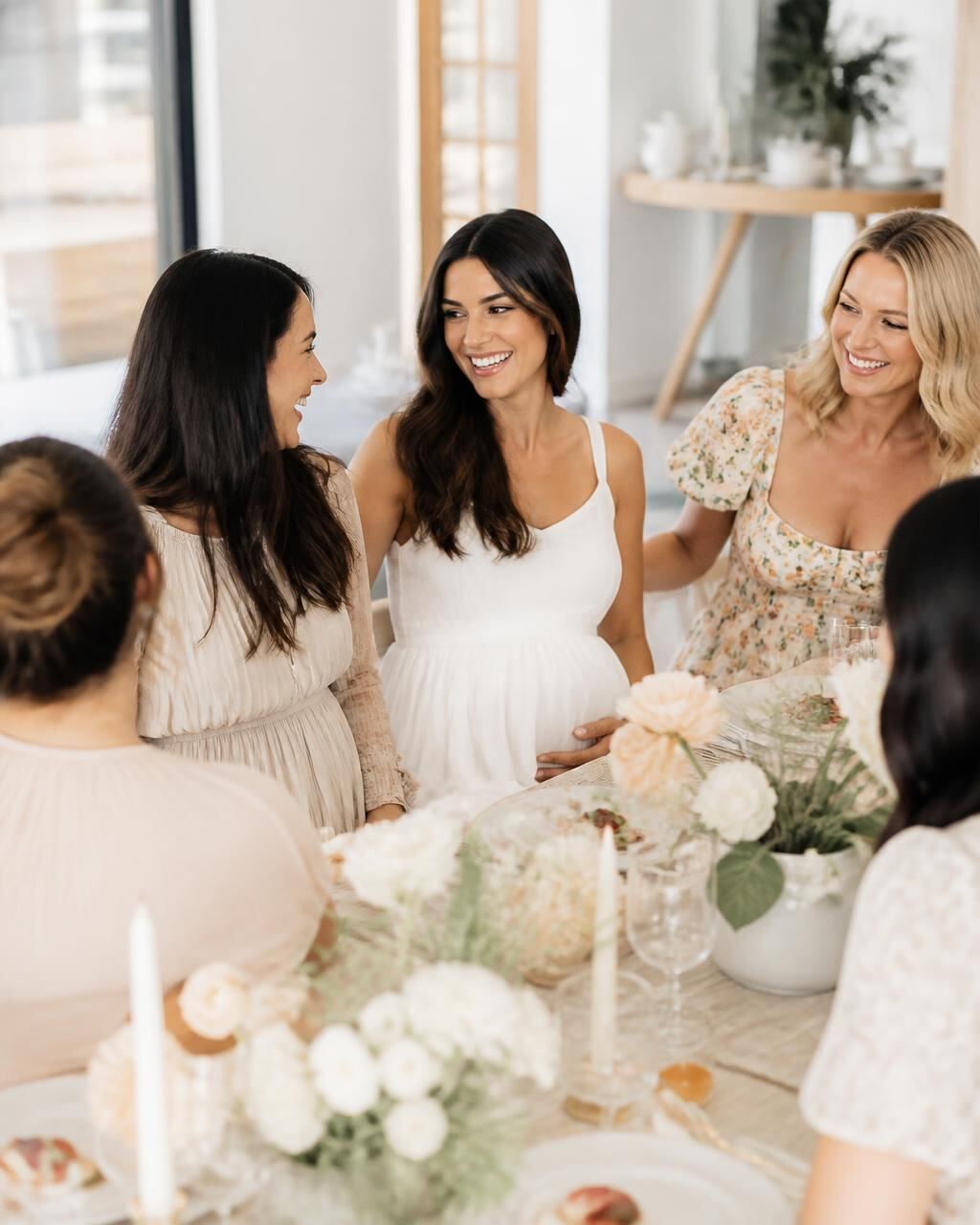Guests celebrating together at an elegant baby shower brunch in Houston